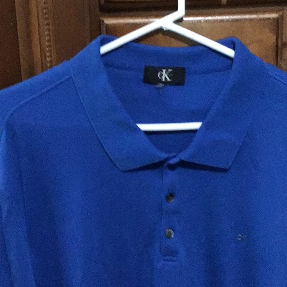 XL men’s Calvin Klein blue polo top.